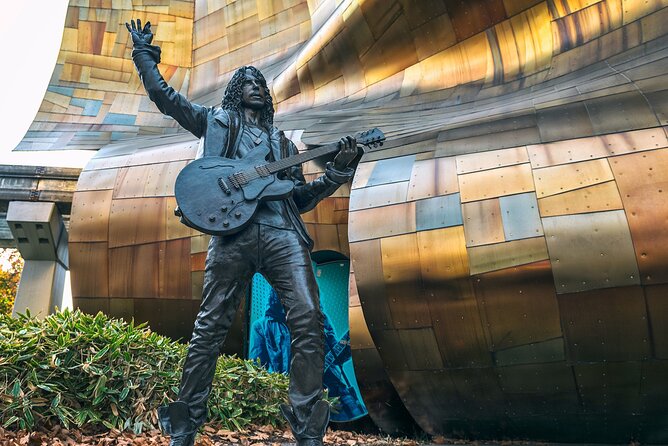 Seattle Sightseeing Scenic Guided Tour and Hop On Hop Off Pass - Stops 15 to 16: Waterfront return and the first Starbucks area